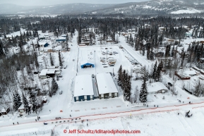 A team runs down Broadmoore street in a subdivision after leaving the start line at Pike's Landing in Fairbanks on Monday March 9, 2015 during Iditarod 2015.(C) Jeff Schultz/SchultzPhoto.com - ALL RIGHTS RESERVED DUPLICATION  PROHIBITED  WITHOUT  PERMISSION