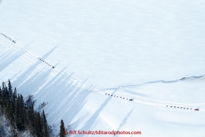 Four teams run down the Tanana River on the way to Nenana, the first checkpoint of the 2015 Iditarod on March 9th, 2015 during the 2015 Iditarod.(C) Jeff Schultz/SchultzPhoto.com - ALL RIGHTS RESERVED DUPLICATION  PROHIBITED  WITHOUT  PERMISSION