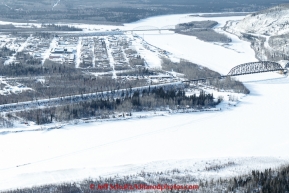 A team runs down the Tanana River as he approaches the first checkpoint of Nenana on March 9th, 2015 during the 2015 Iditarod.(C) Jeff Schultz/SchultzPhoto.com - ALL RIGHTS RESERVED DUPLICATION  PROHIBITED  WITHOUT  PERMISSION