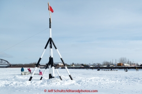 Linwood Fiedler runs down the Tanana River and past the Ice Classic tripod shorlty after leaving the first checkpoint of Nenana on March 9th, 2015 during the 2015 Iditarod.(C) Jeff Schultz/SchultzPhoto.com - ALL RIGHTS RESERVED DUPLICATION  PROHIBITED  WITHOUT  PERMISSION