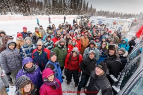 A group of volunteers pose for a picture at the offical start of the 2015 Iditarod in Fairbanks, Alaska.(C) Jeff Schultz/SchultzPhoto.com - ALL RIGHTS RESERVED DUPLICATION  PROHIBITED  WITHOUT  PERMISSION