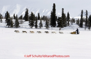 Tuesday March 6, 2012 Dan Seavey on Puntilla Lake in the morning just before arriving at the Rainy Pass checkpoint, Iditarod 2012.