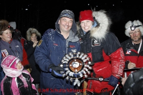 Tuesday March 6, 2012 Aliy Zirkle arrived first to the McGrath checkpoint in the Iditarod 2012, winning the PenAir Spirit of Alaska Award.  PenAir President, Danny Seybert, gave the award to Aliy.