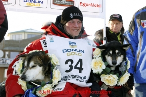 Tuesday March 13, 2012  Dallas Seavey poses with his lead dogs at the finish line in Nome shorlty after Dallas won the 2012 Iditarod.