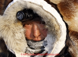 Tuesday March 13, 2012  Mike Williams, Jr. bundled up at the White Mountain checkpoint. Iditarod 2012.