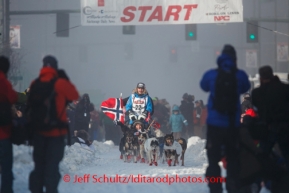 Norwegian Robert Sorlie drives his dog team along Fourth Avenue during the ceremonial start to Iditarod 2014 Ceremonial in downtown Anchorage, Alaska.Iditarod Sled Dog Race 2014PHOTO (c) BY JEFF SCHULTZ/IditarodPhotos.com -- REPRODUCTION PROHIBITED WITHOUT PERMISSION