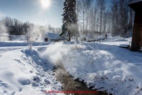 Lance Mackey passes the hot springs after leaving the checkpoint of Manley Hot Springs on March 10, 2015.  This is the second checkpoint of the 2015 Iditarod.(C) Jeff Schultz/SchultzPhoto.com - ALL RIGHTS RESERVED DUPLICATION  PROHIBITED  WITHOUT  PERMISSION