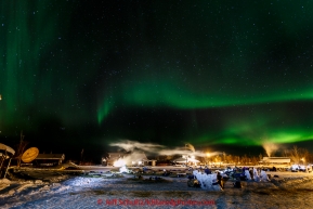 Northern Lights dance overhead of resting teams at the Huslia checkpoint early on Sunday  March 15, 2015 during Iditarod 2015.  (C) Jeff Schultz/SchultzPhoto.com - ALL RIGHTS RESERVED DUPLICATION  PROHIBITED  WITHOUT  PERMISSION