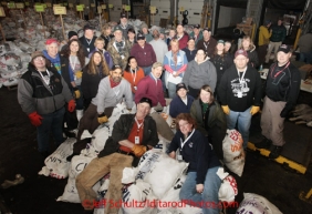 Wednesday February 15, 2012.  Iditarod volunteers pose for a group photo as they prepare musher's