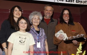 Sunday March 18, 2012   recieves the             award at the musher's finisher banquet in Nome after Iditarod 2012.