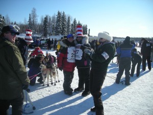 Gebhardt and Hugh Neff (with hat) extend last regards before the start