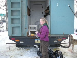 sonny's daughter Ava with task of lifting dogs into the truck