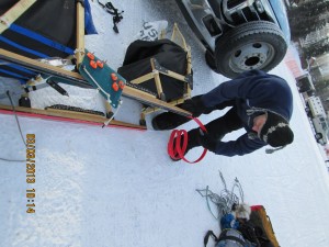 martin slides on new plastic to his sled runner