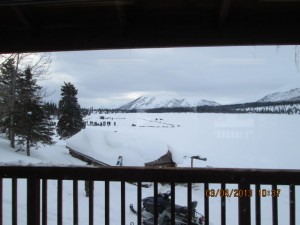 view of the dog yard from lodge at rainy pass.  the dog yard is on the ice of the lake