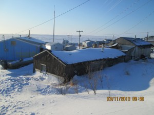 typical view to village of koyuk from checkpoint to ice of norton bay