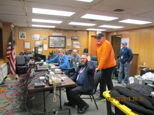 Our production room in Nome.  Stan Hooley, in orange coat, is executive director of the Iditarod.  He oversees all aspects of the Iditarod operation, including our media project.